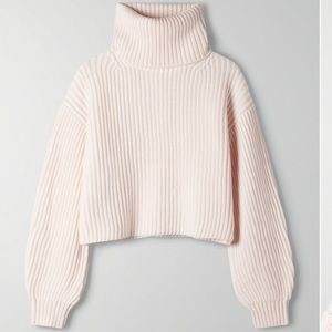 Aritzia Guell sweater in white size xsmall. Never worn/washed.